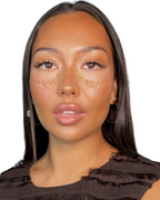 Model wearing Gold Mini Glam Kit freckles