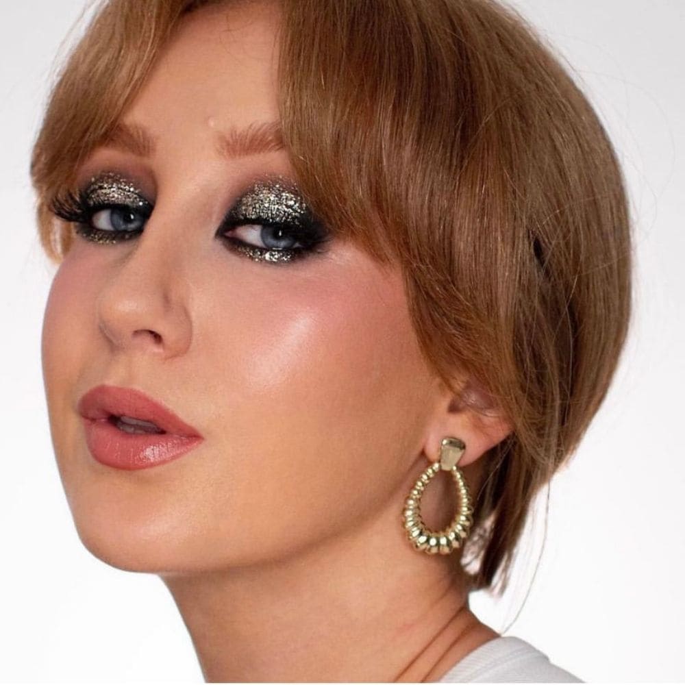 Model wearing Silver Holographic glitter on eyes
