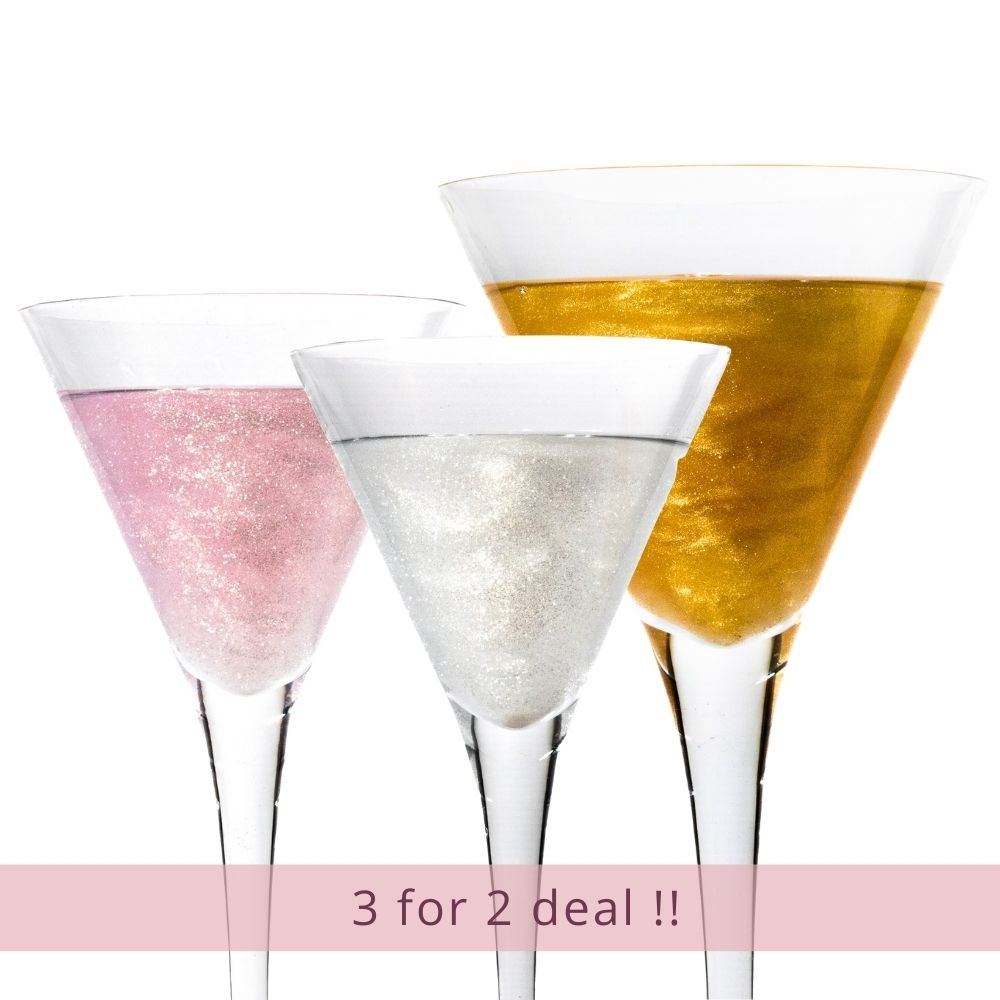 3 sparkly drinks with edible glitter, in gold, silver and pink.